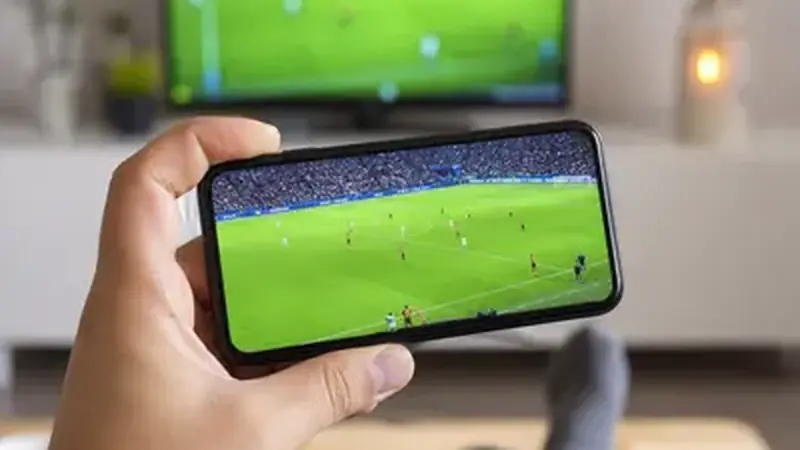 Television showing a grid of sports channels with football content